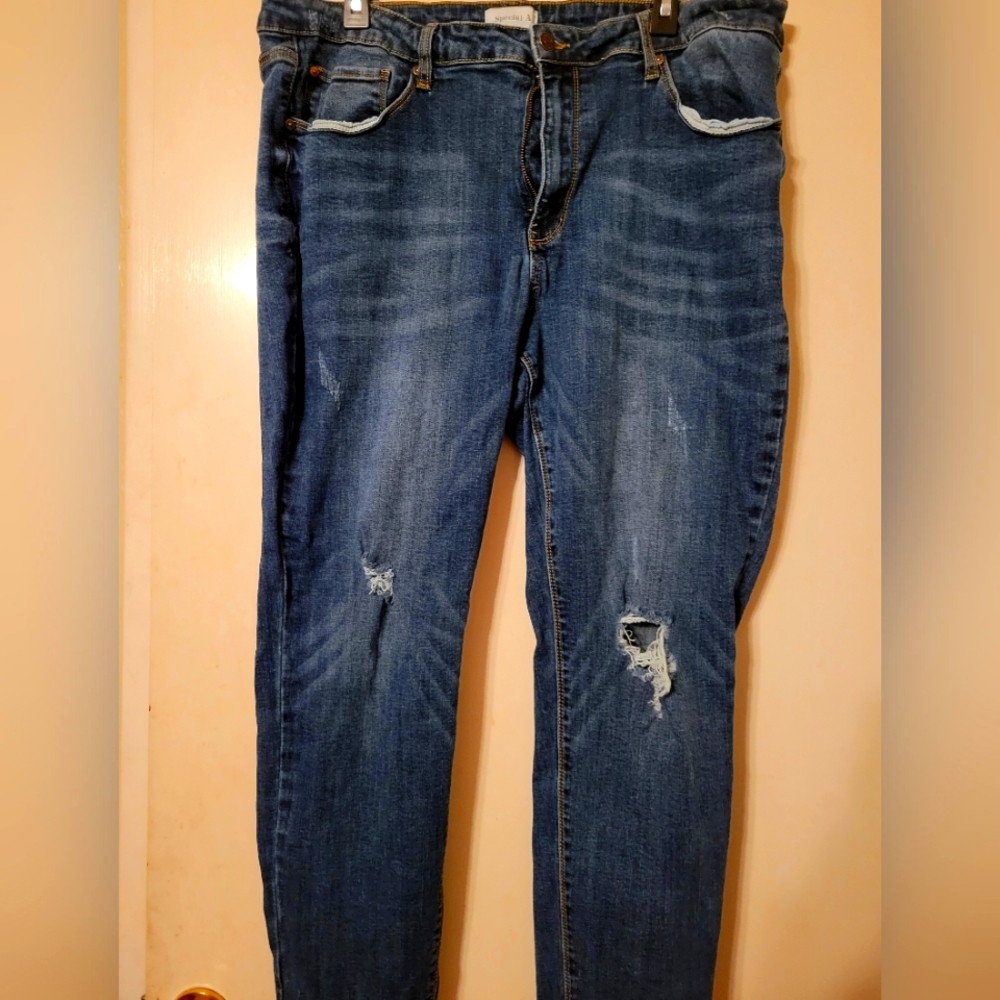 Distressed dark wash plus size blue jeans